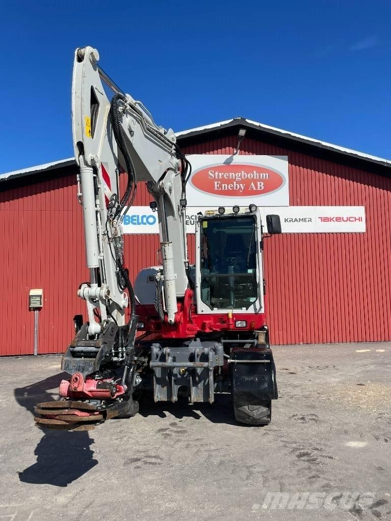 Takeuchi TB 295 W Колёсные экскаваторы