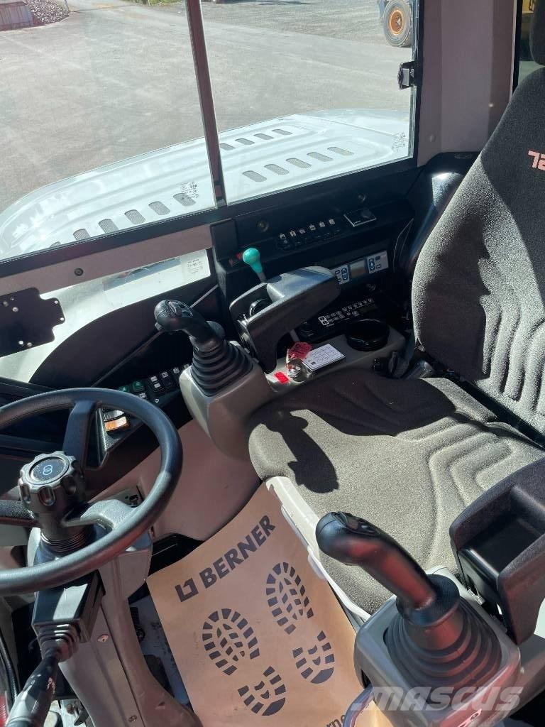 Takeuchi TB 295 W Колёсные экскаваторы