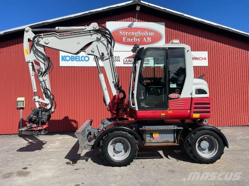 Takeuchi TB 295 W Колёсные экскаваторы