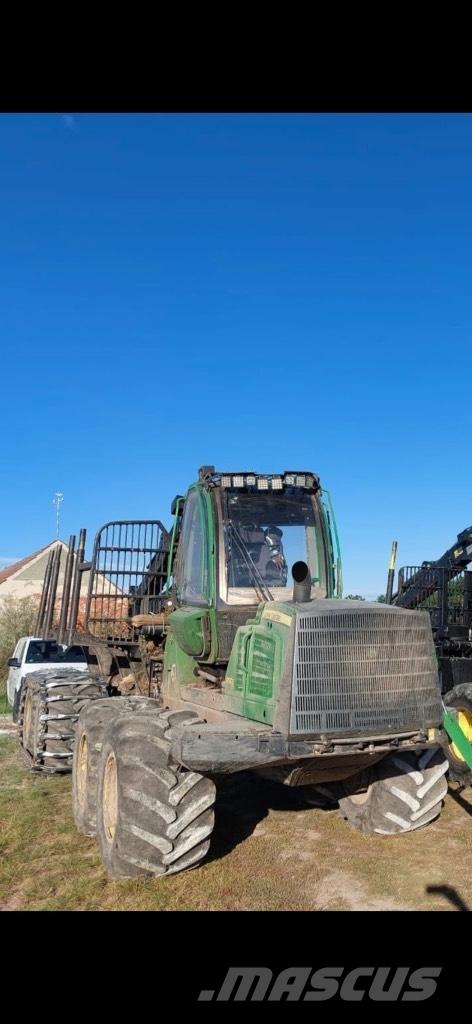 John Deere 1110E Форвардеры