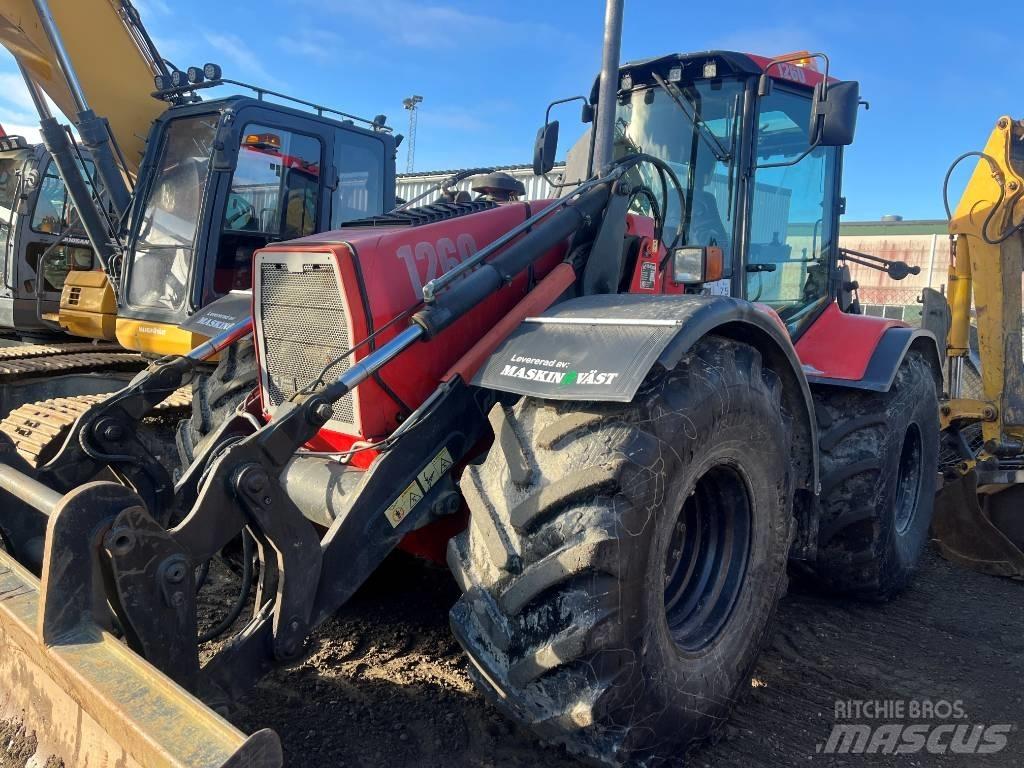 Huddig 1260 Экскаваторы-погрузчики