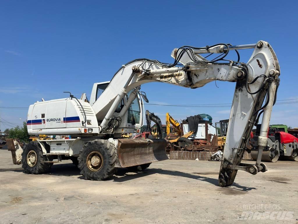 New Holland MH Plus Колёсные экскаваторы