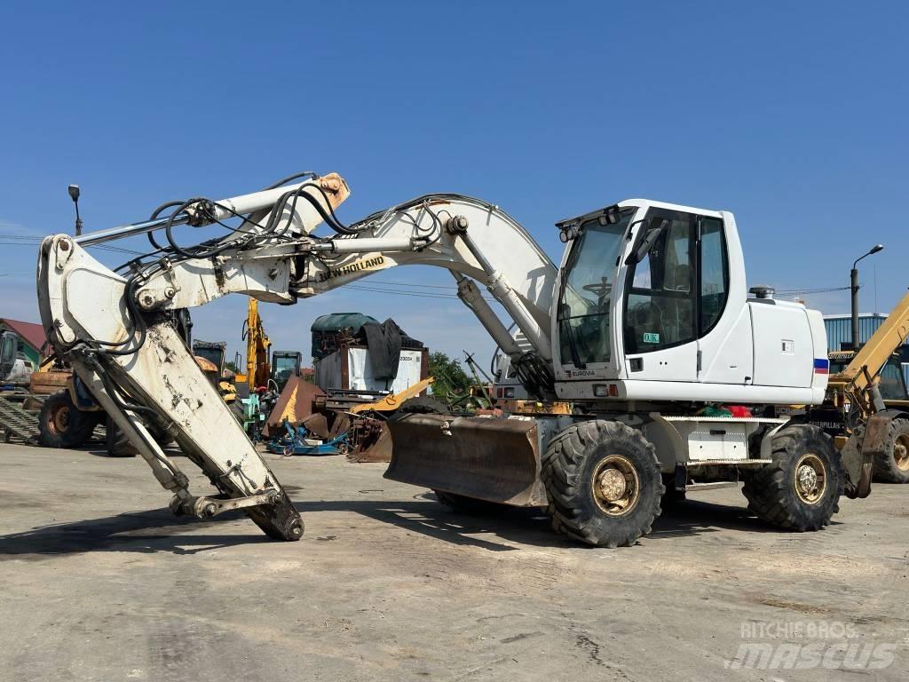 New Holland MH Plus Колёсные экскаваторы