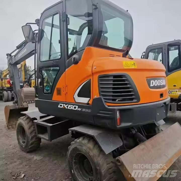 Doosan DX60W Колёсные экскаваторы