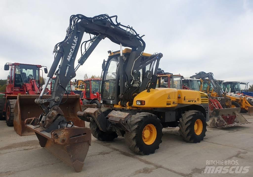 Mecalac 12 M TX Колёсные экскаваторы