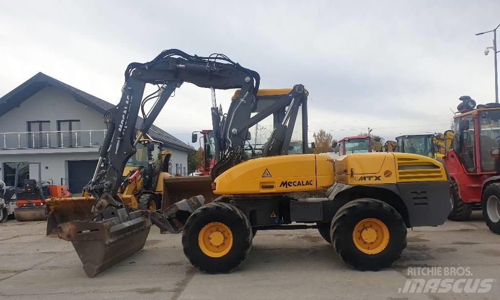 Mecalac 12 M TX Колёсные экскаваторы