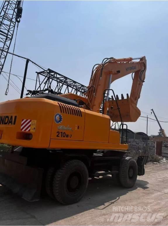 Hyundai 210W-7 Колёсные экскаваторы