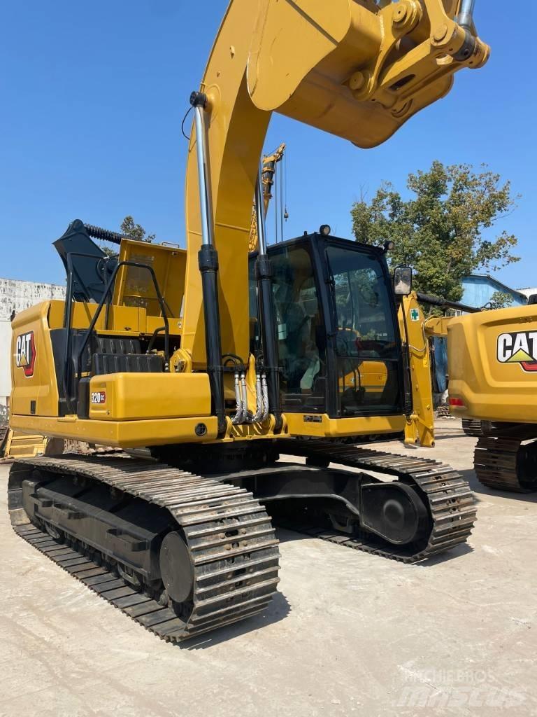CAT 320 GC Колёсные экскаваторы