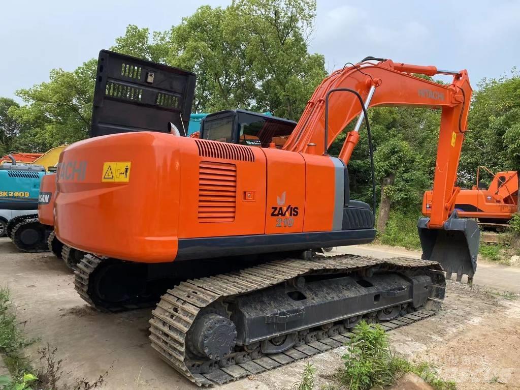 Hitachi ZX 210 Гусеничные экскаваторы