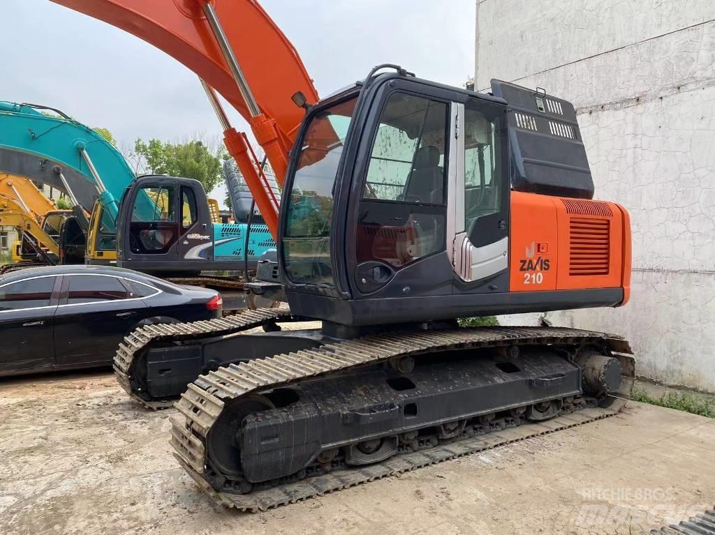 Hitachi ZX 210 Гусеничные экскаваторы