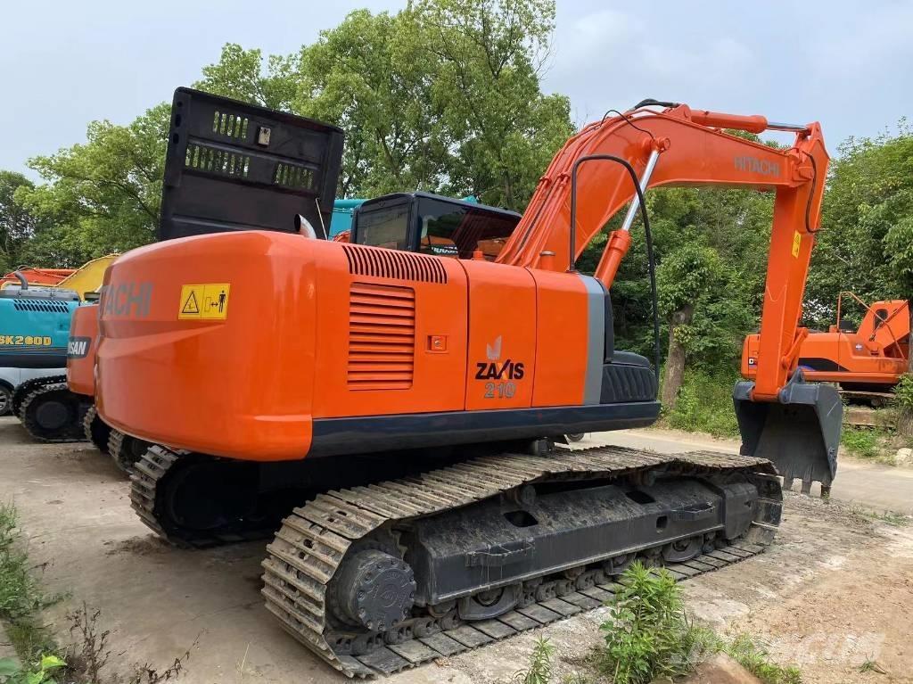 Hitachi ZX 210 Гусеничные экскаваторы