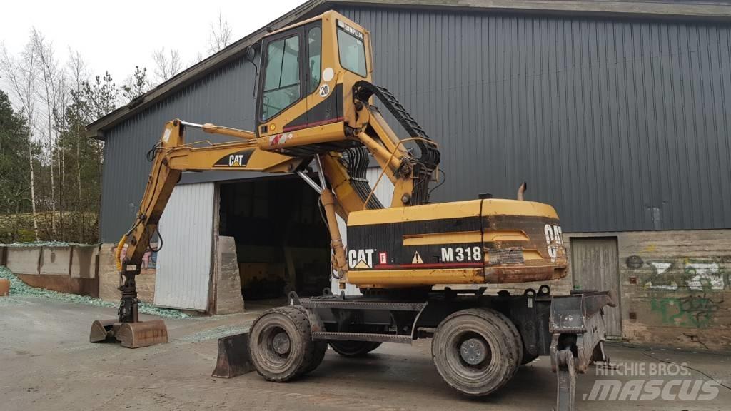 CAT M 318 Перегружатели металлолома/промышленные погрузчики