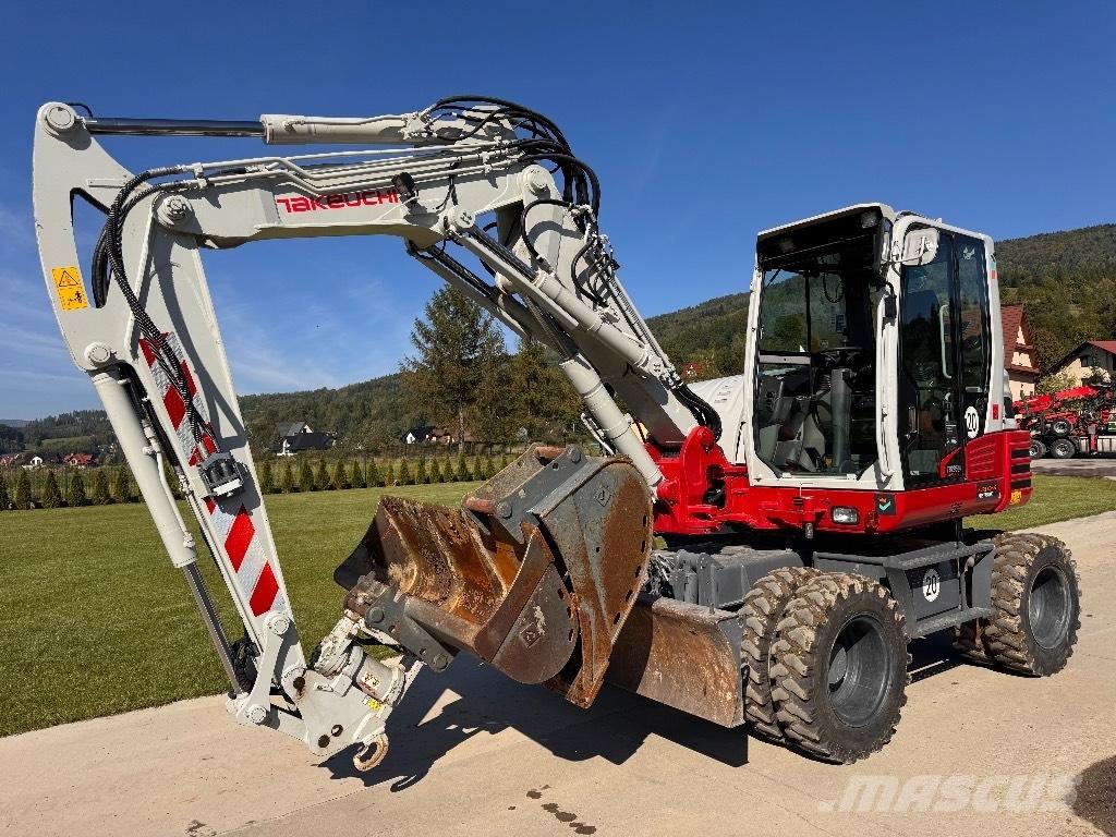 Takeuchi TB 295 W Колёсные экскаваторы