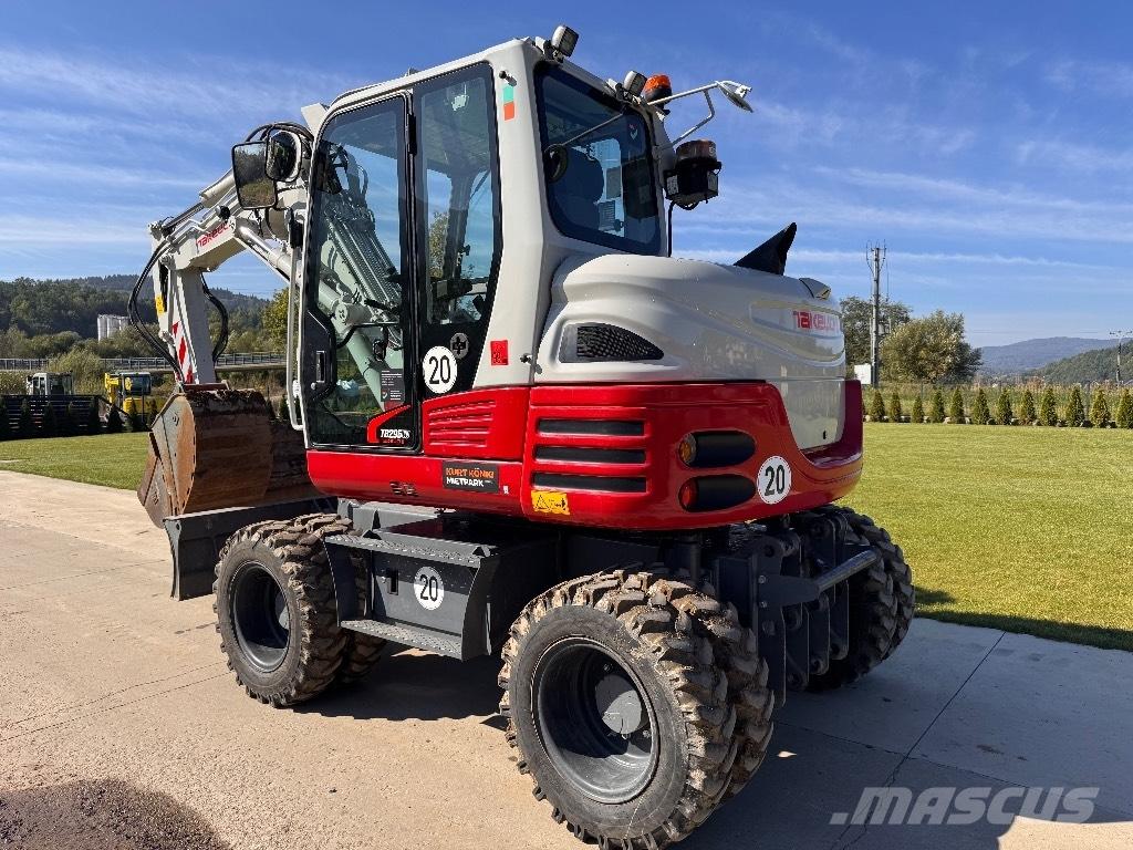 Takeuchi TB 295 W Колёсные экскаваторы