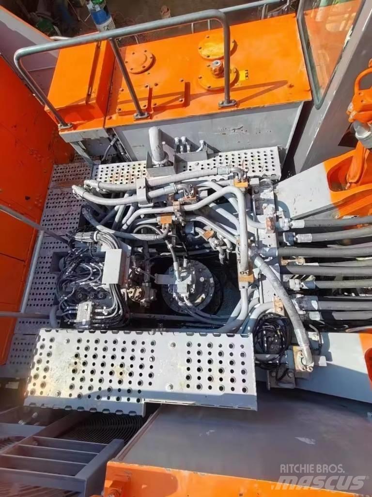 Hitachi EX 1200 Гусеничные экскаваторы