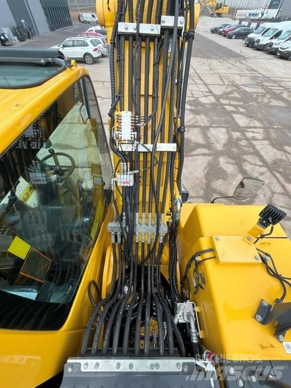 Komatsu PW160-11 Колёсные экскаваторы