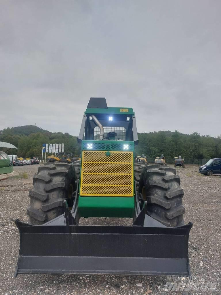 Timberjack 450C Лесохозяйственные тракторы