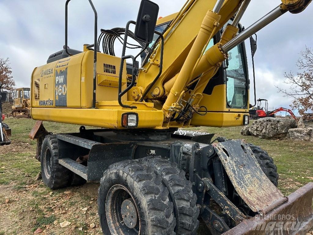 Komatsu PW 160-7E0 Колёсные экскаваторы