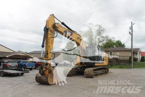 CAT 323FL Гусеничные экскаваторы