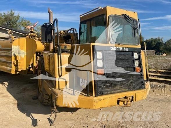 CAT 613C Поливочные машины