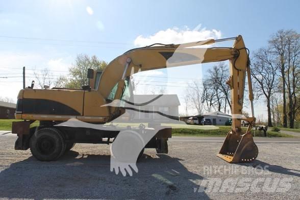 CAT M318C Колёсные экскаваторы