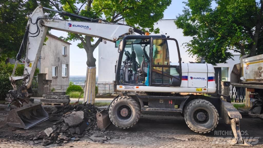 CAT 313 D Колёсные экскаваторы
