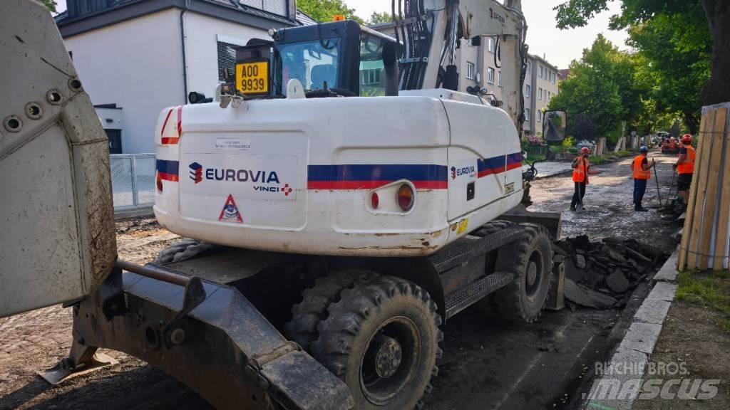 CAT 313 D Колёсные экскаваторы