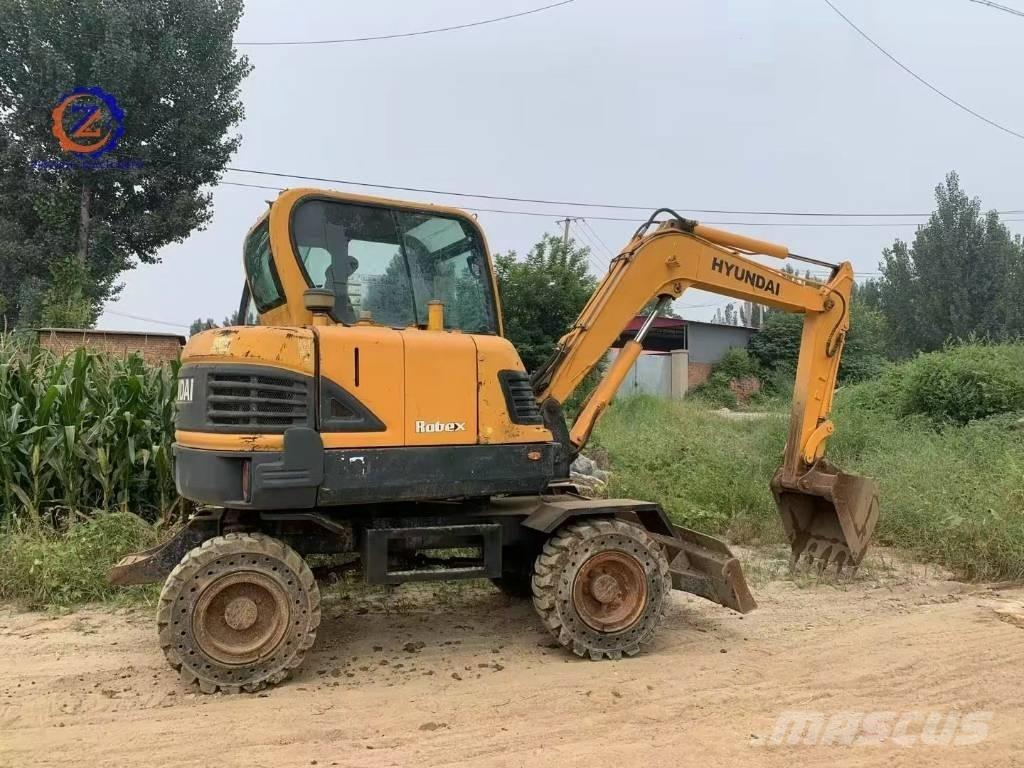 Hyundai 60 W Колёсные экскаваторы