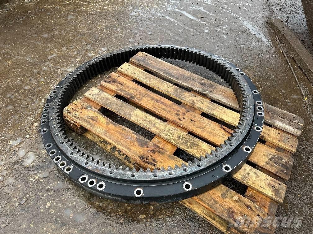 CAT 323 slew ring Оси