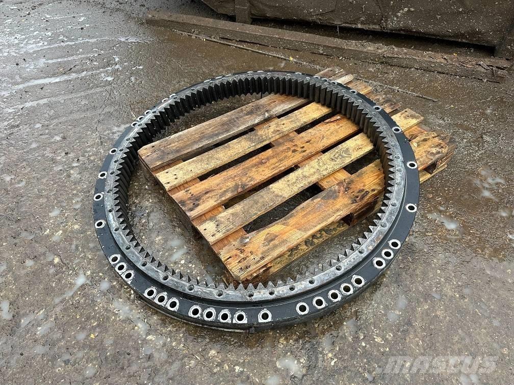 CAT 323 slew ring Оси