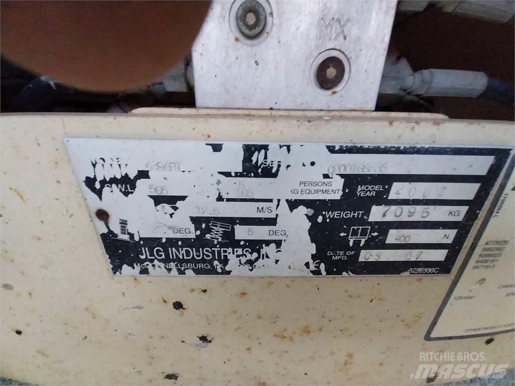 JLG 4394RT Ножничные подъемники