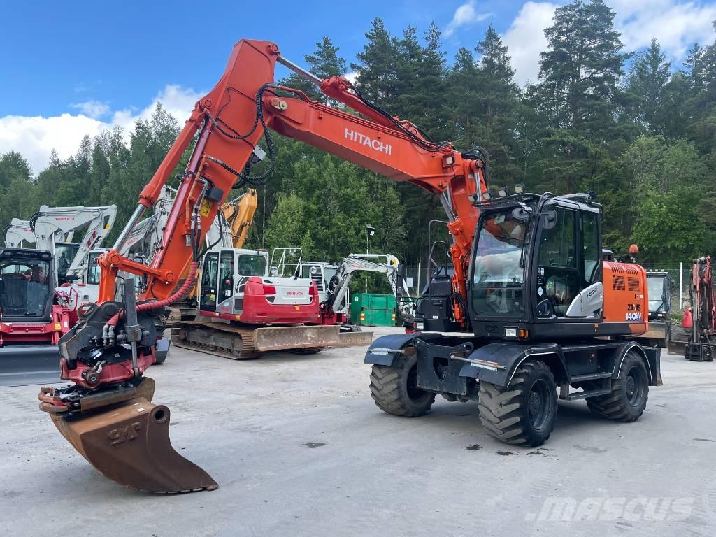 Hitachi 140W Колёсные экскаваторы
