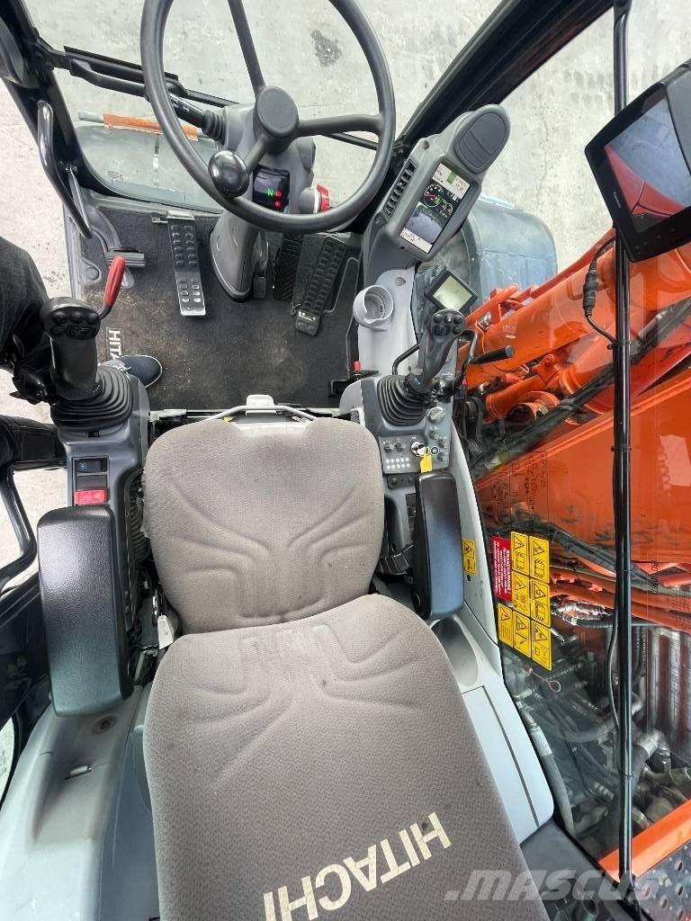 Hitachi 140W Колёсные экскаваторы