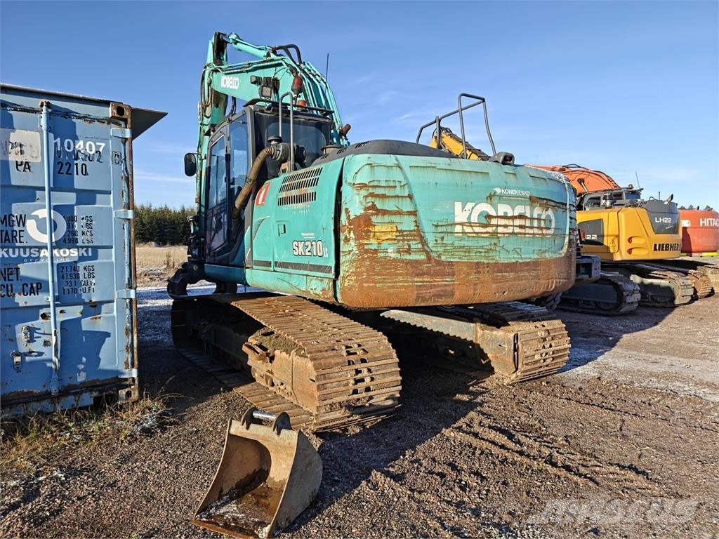 Kobelco SK210 Гусеничные экскаваторы