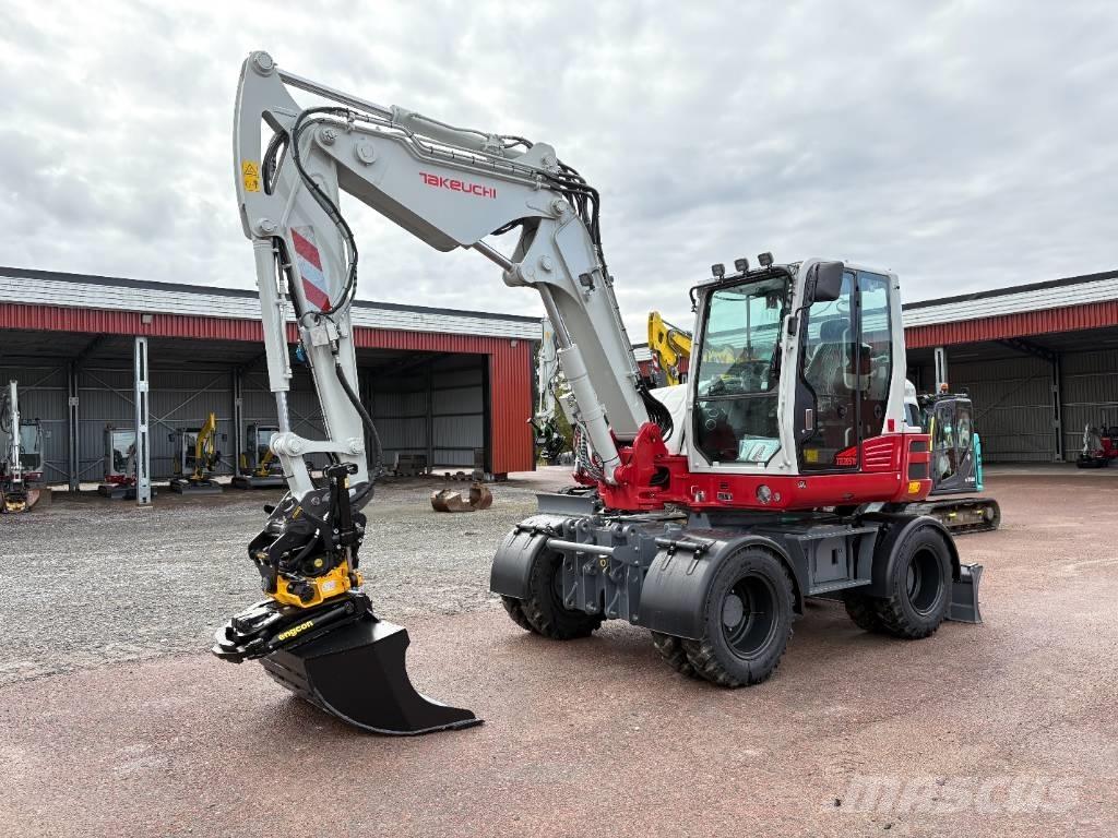 Takeuchi TB395W Колёсные экскаваторы