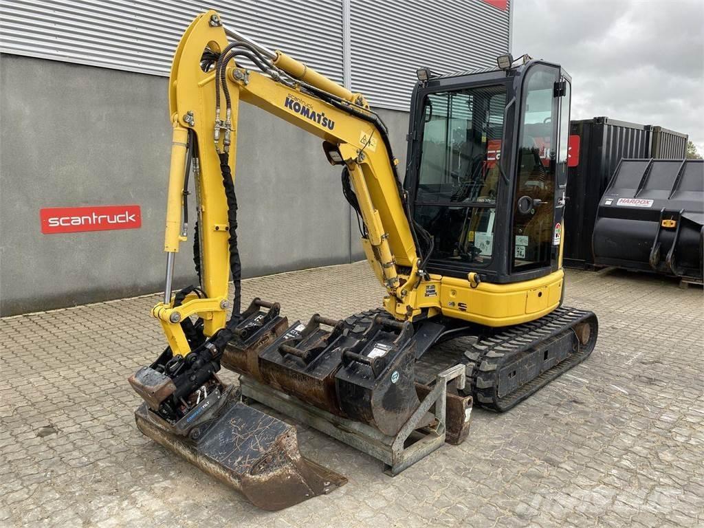 Komatsu PC26MR-3 Колёсные экскаваторы