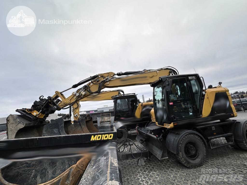 CAT M 315 Колёсные экскаваторы