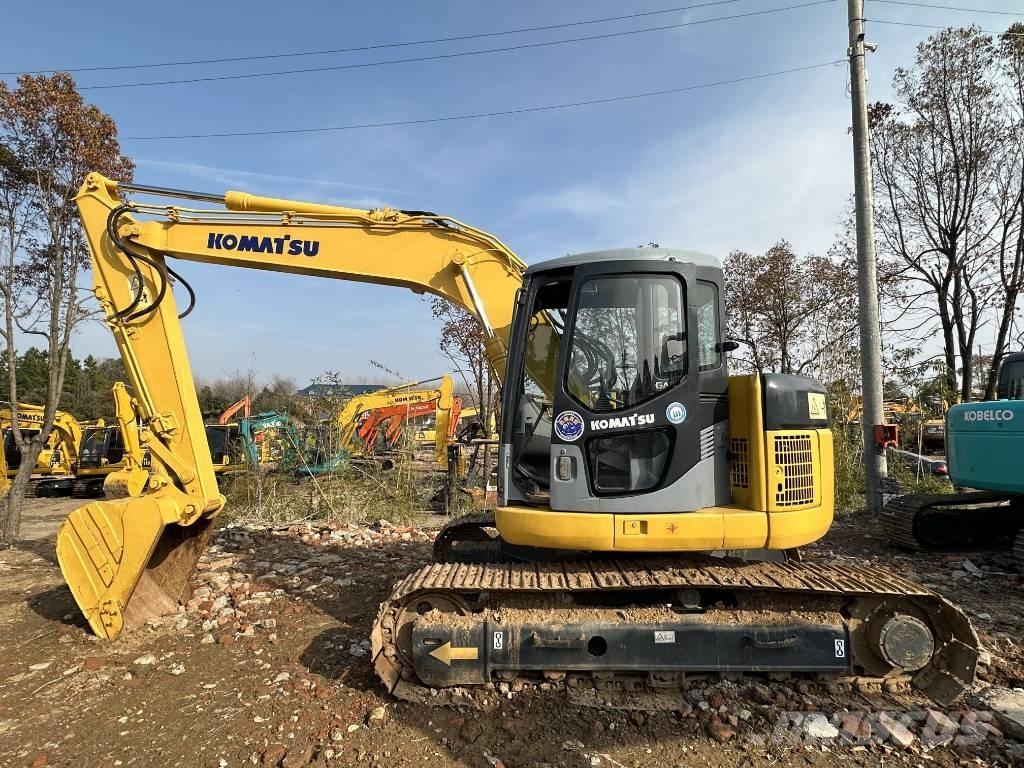 Komatsu PC 128 US Гусеничные экскаваторы