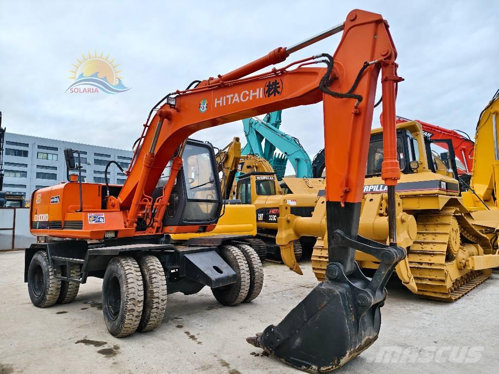 Hitachi EX 100 W D Колёсные экскаваторы