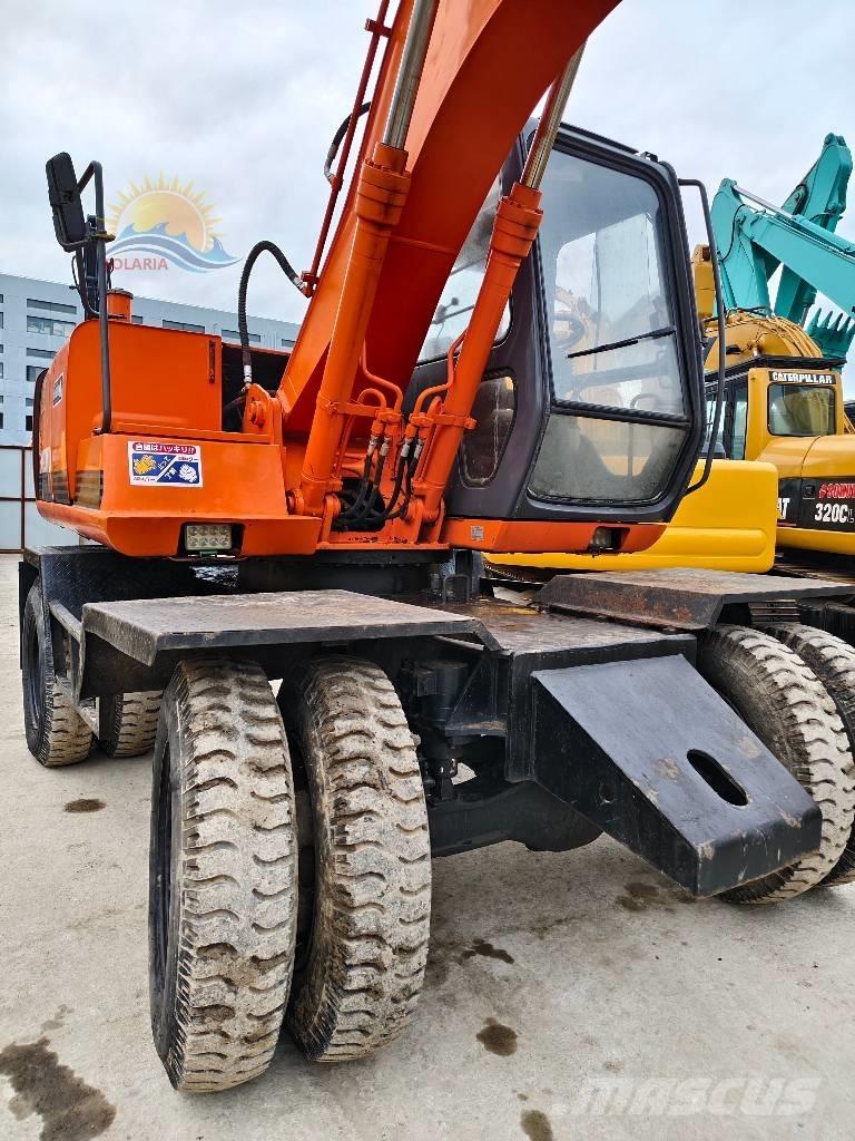 Hitachi EX 100 W D Колёсные экскаваторы