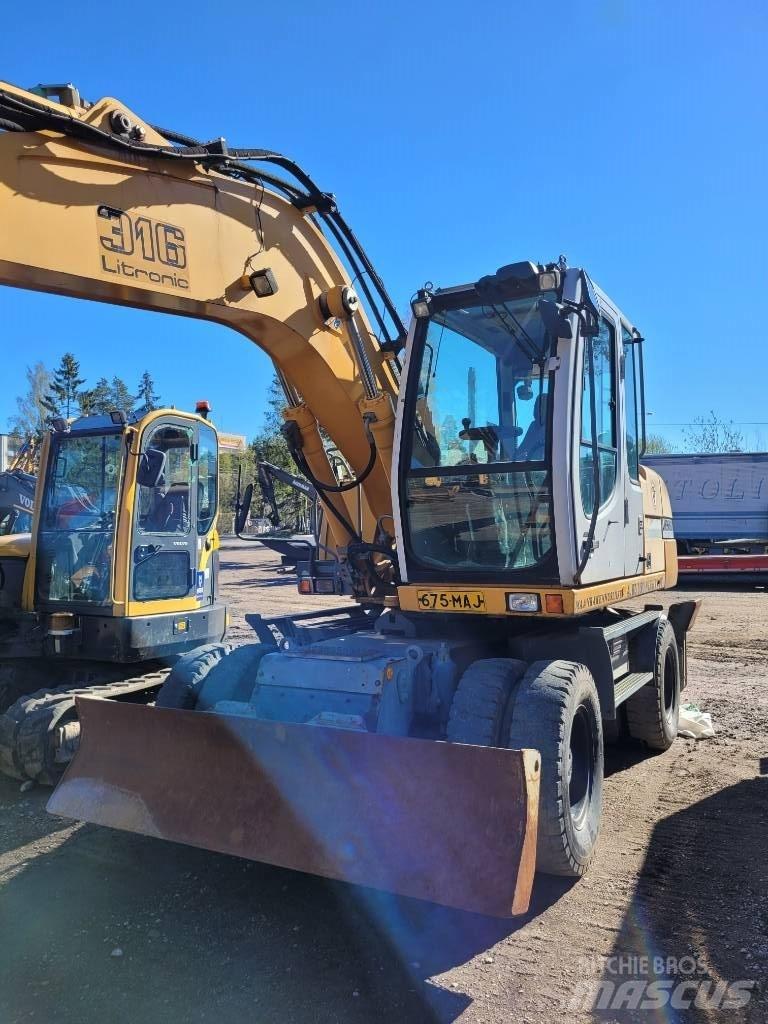 Liebherr 316 Колёсные экскаваторы