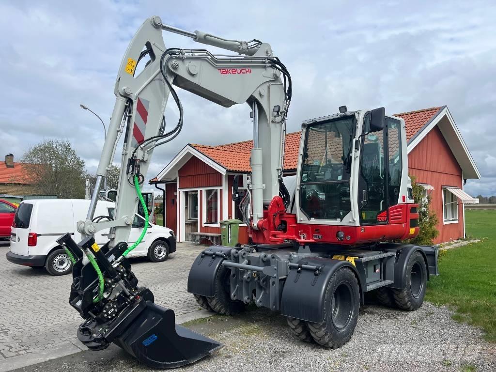 Takeuchi TB 395 W Колёсные экскаваторы