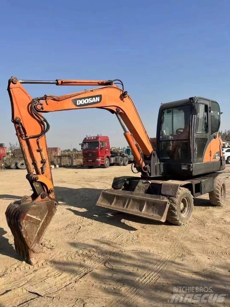 Doosan DX60W Колёсные экскаваторы