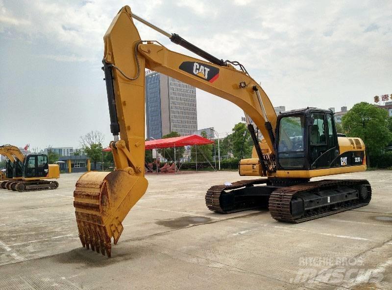 CAT 323 Гусеничные экскаваторы