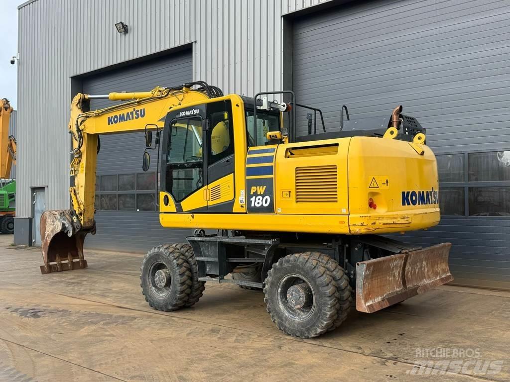 Komatsu PW180-11 Колёсные экскаваторы