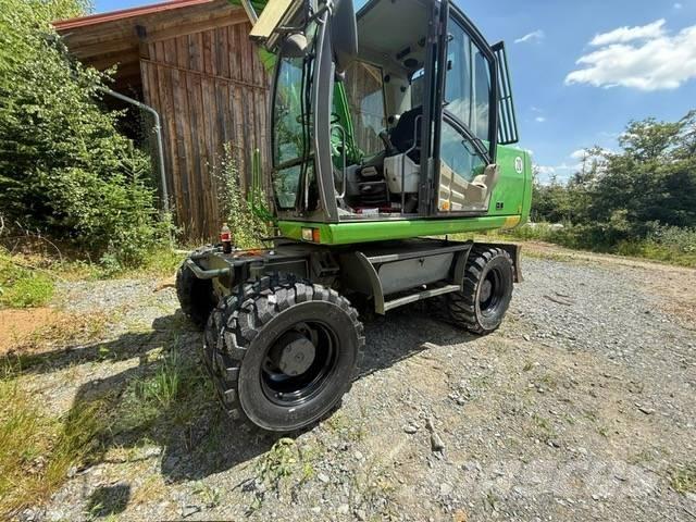 Atlas Mobilbagger Колёсные экскаваторы