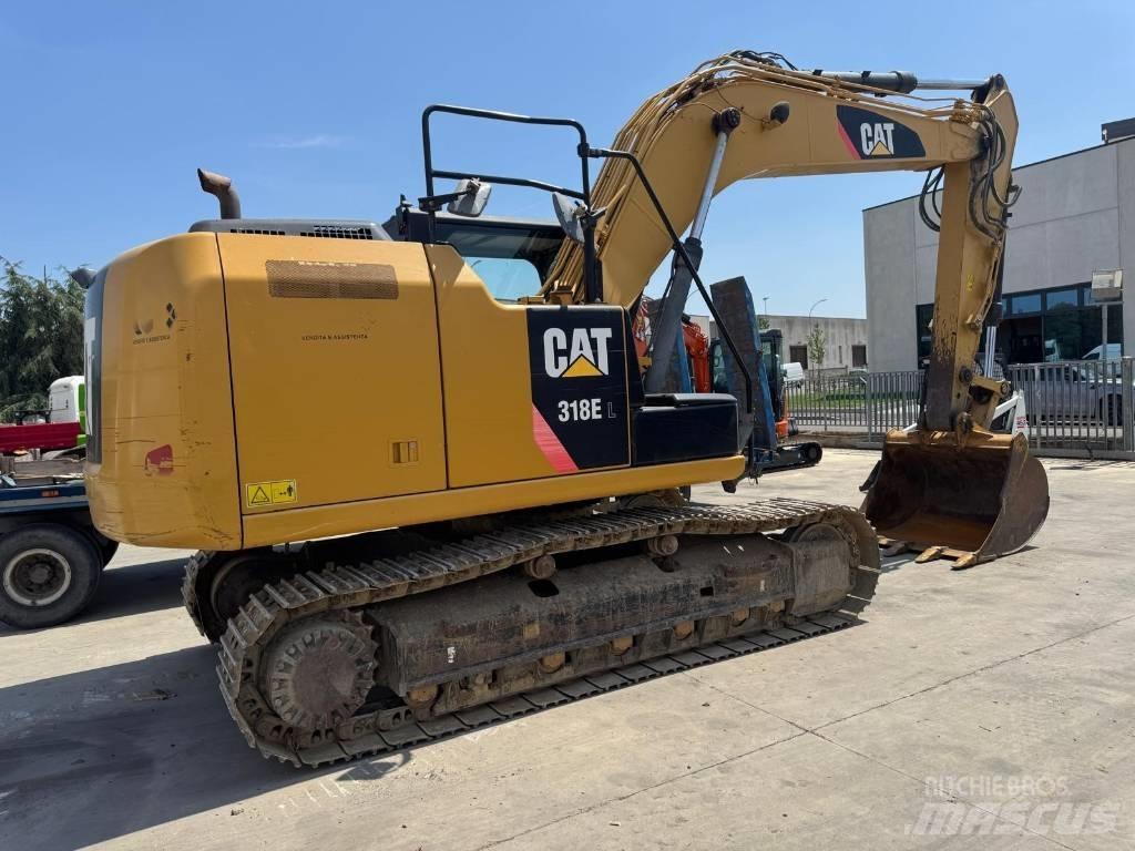 CAT 318E Гусеничные экскаваторы