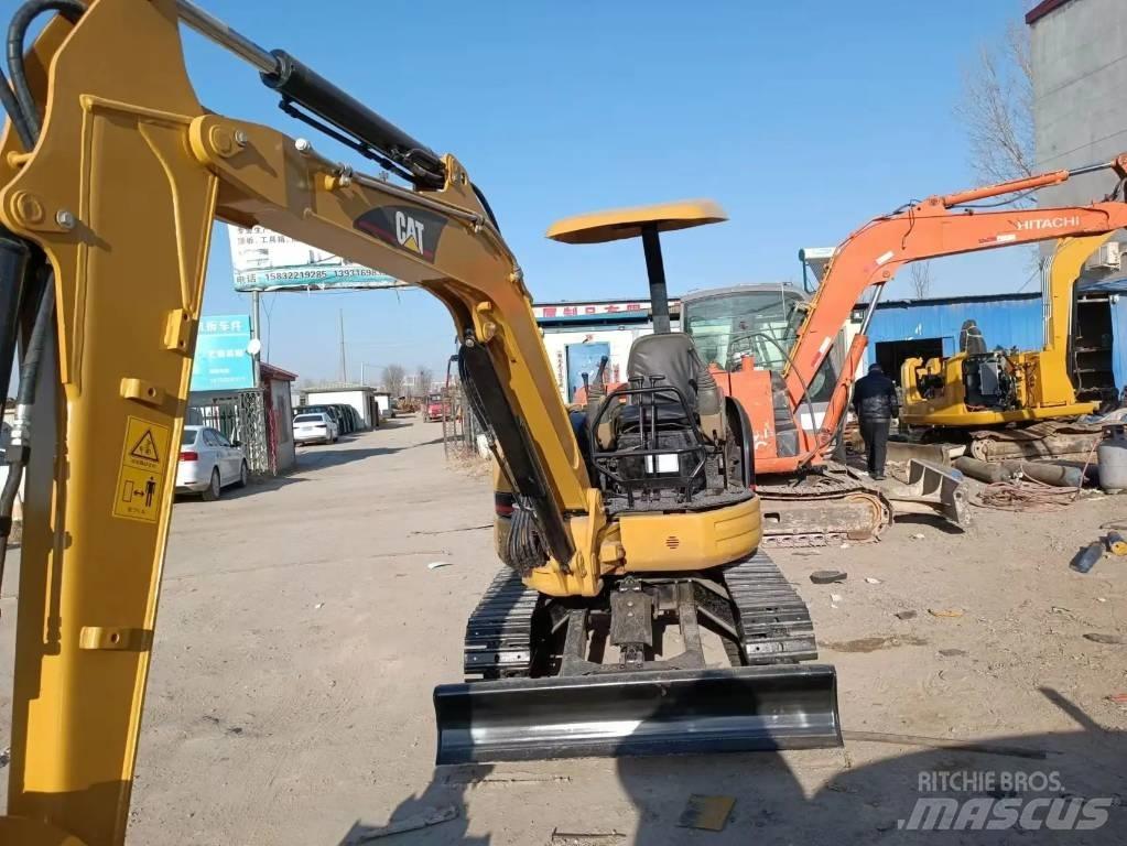 CAT 303 CR Мини-экскаваторы