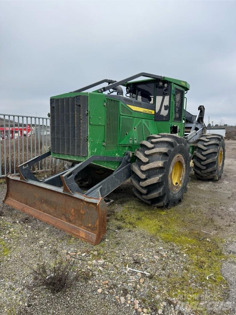 John Deere 748 Трелевочные трактора