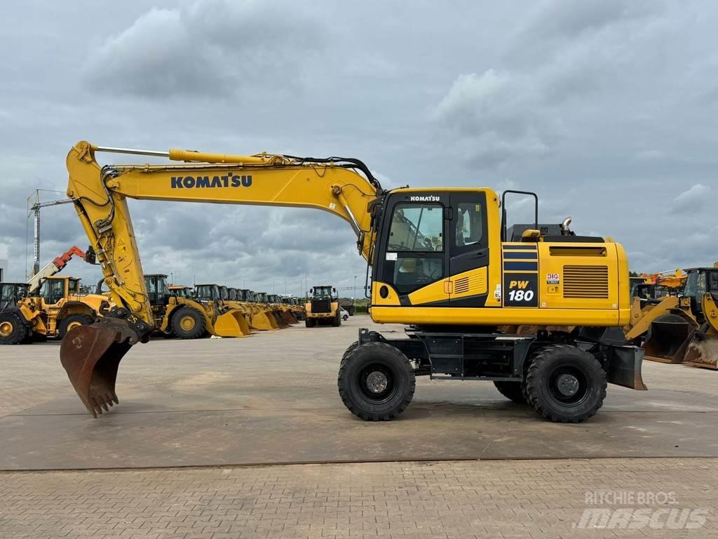 Komatsu PW180-11 Колёсные экскаваторы